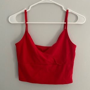 red cross over cropped tank top